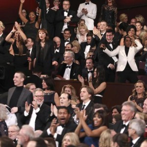 The cast of "Moonlight" celebrates as "Moonlight" wins the best picture award at the Oscars on Sunday, Feb. 26, 2017, at the Dolby Theatre in Los Angeles. (Photo by Matt Sayles/Invision/ANSA/AP) [CopyrightNotice: 2017 Invision]