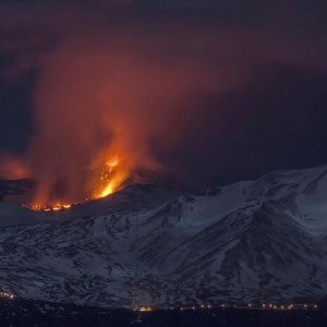 Snow-covered Mount Etna, Europe's most active volcano, spews lava during an eruption in the early hours of Thursday, March 16, 2017. A new eruption which began on March 15 is causing no damages to Catania's airport which is fully operational. (ANSA/AP Photo/Salvatore Allegra)