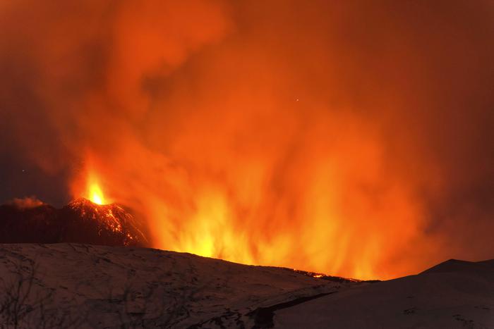 Snow-covered Mount Etna, Europe's most active volcano, spews lava during an eruption in the early hours of Thursday, March 16, 2017. A new eruption which began on March 15 is causing no damages to Catania's airport which is fully operational. (ANSA/AP Photo/Salvatore Allegra)