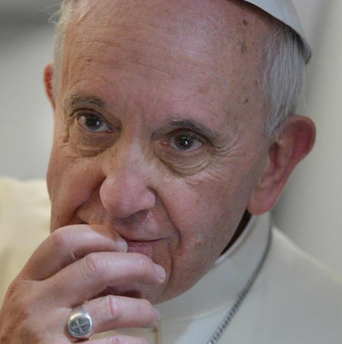 Papa Francesco durante la conferenza stampa a bordo dell'aereo che lo riporta a Roma da Rio de Janeiro, 29 luglio 2013.
ANSA/LUCA ZENNARO/POOL