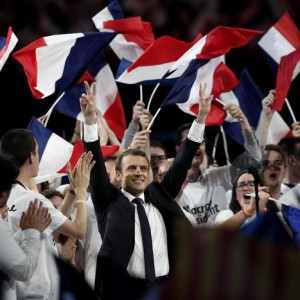 epa05946110  (FILE) A file picture dated 17 April 2017 shows French presidential election candidate from the centrist 'En Marche!' (Onward!) political party, Emmanuel Macron (C) gesturing toward the audience after making his speech, during his political campaign rally at the AccorHotels Arena, in Paris, France. Emmanuel Macron's campaign announced on 05 May 2017 it has been the victim of hacking after nine gigabyte of emails purporting to belong to the campaign were posted online.  EPA/YOAN VALAT