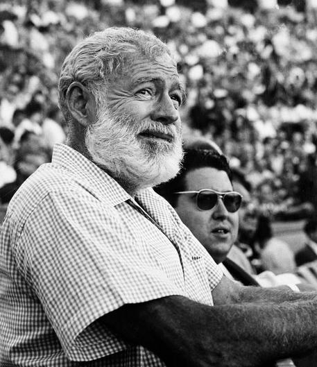 FILE - In this Nov. 1960 file photo, U.S. novelist Ernest Hemingway attending a bullfight in Madrid, Spain. Hemingway had been a reporter during the Spanish Civil War in the late-1930s and his experience there informed perhaps his greatest work, 1940's "For Whom The Bell Tolls." The Swedish Academy awarded Hemingway the Nobel Prize in Literature in 1954 "for his mastery of the art of narrative, most recently demonstrated in 'The Old Man and the Sea,' and for the influence that he has exerted on contemporary style." This year's winner is due to be announced on Oct. 13, 2016. (ANSA/AP Photo, File)