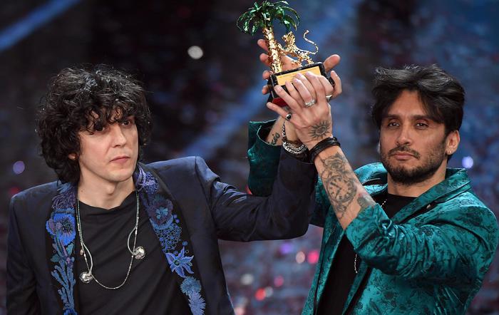 Italian singers Ermal Meta (L) and Fabrizio Moro (R) celebrate on stage  after winning the 68th Sanremo Italian Song Festival in Sanremo, Italy, 10 February 2018. The 68th edition of the television song contest runs from 06 to 10 February.   ANSA/CLAUDIO ONORATI