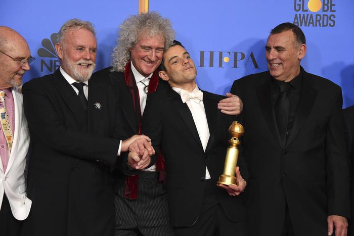 Jim Beach, from left, Roger Taylor, Brian May, Rami Malek and Graham King pose in the press room at the 76th annual Golden Globe Awards at the Beverly Hilton Hotel on Sunday, Jan. 6, 2019, in Beverly Hills, Calif. (Photo by Jordan Strauss/Invision/ANSA/AP)