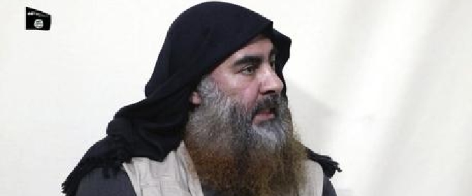 This image made from video posted on a militant website on Monday, April 29, 2019, purports to show the leader of the Islamic State group, Abu Bakr al-Baghdadi, being interviewed by his group's Al-Furqan media outlet. 
(Al-Furqan media via AP)